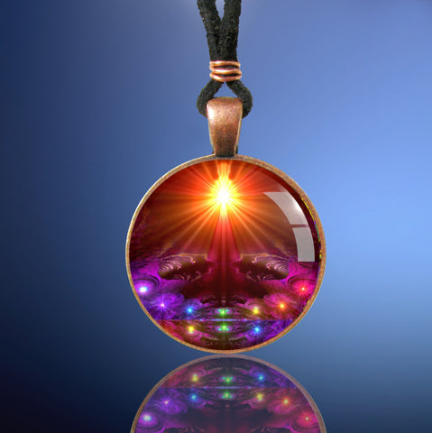 chakra art copper finished necklace with abstract chakra artwork under glass with an orange starburst at the top of the art