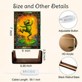 Small acrylic table lamp featuring a dancing frog artwork  in oranges, greens, and reds with a stained glass-effect border. Dimensions and other details. Art by Primal Painter