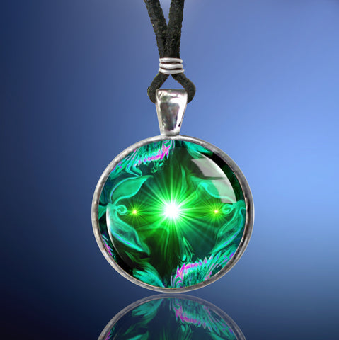 Round silver necklace against a blue background and features green twin flame heart chakra energy art with a green starburst in the center of two abstract angels