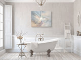 Subtle peach, gray, and plum abstract art canvas print called The Angelic Realm by Primal Painter, hanging over a bathtub