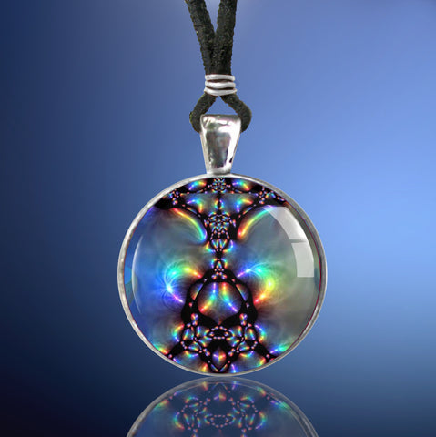 Handmade round necklace with abstract art print sealed under glass in a rainbow pattern, artwork by Primal Painter