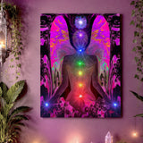 Colorful chakra art stretched canvas print of a fuchsia angel torso with wings and the seven chakras in a line with a Reiki symbol over her head. Canvas Print called Balance wtihin Chaos by Primal Painter. Hanging on a mauve wall