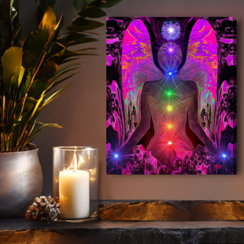 Colorful chakra art stretched canvas print of a fuchsia angel torso with wings and the seven chakras in a line with a Reiki symbol over her head. Canvas Print called Balance wtihin Chaos by Primal Painter. Hanging over a shelf with a candle
