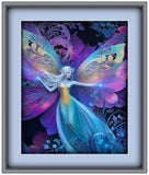 Framed artwork of a fairy with colorful wings and flowing dress against a dark background.