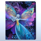 Colorful fairy with butterfly wings on a dark background
