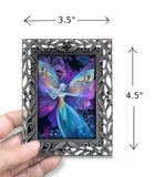 Framed artwork of a fairy with colorful wings held by a hand, with dimensions indicated.