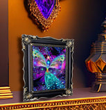 Rainbow angel art print by Primal Painter featuring a very colorful angel with butterfly wings, chakra colors, and orbs of energy. Bubbles of Clearing. Framed on a shelf