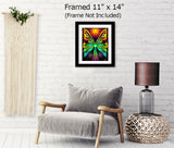 The Butterfly Effect by Primal Painter is an art print featuring  Huge butterfly wings on a green fairy with a rainbow dress and a large orange starburst over head, wings are gradations of green and teal to orange and yellow. Framed and hanging over a chair