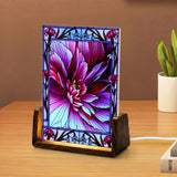 Flower themed abstract art night light in  magenta, purple, and violet with  a stained-glass style border. Art by Primal Painter. Side View
