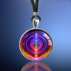 Handmade chakra necklace featuring a metaphysical art print by Primal Painter sealed under glass of the seven chakras in a vertical line encircled by wings