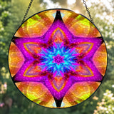 Textured glass suncatcher featuring a mandala with six points representing Connections in vibrant pink, yellow and blue colors 