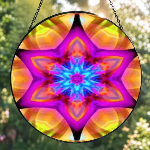 Textured glass suncatcher featuring a mandala with six points representing Connections in vibrant pink, yellow and blue colors 