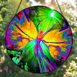 Back view: Textured round glass suncatcher featuring rainbow fairy artwork by Primal Painter. 