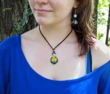 Rainbow fairy art necklace, worn by a model