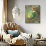 Elowen of the Woodland Realm by Primal Painter is a canvas art print in earth tones of moss, yellow ochre, taupe, and brown. Hanging over a cozy boho chair