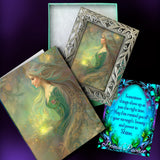 Framed mini goddess  art print of Elowen of the Woodland Realm by Primal Painter as a gift set with a matching story card, blessing card, and teal gift box. 
