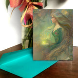 Goddess art story card with quote and lore of Elowen of the Woodland Realm on the inside by Primal Painter. Earth tones. Blue envelope