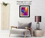 Rainbow reiki angel with a very bright fuchsia and purple background with orange highlights, green starbursts. Art Print called The Gift by Primal Painter. Framed hanging over a chair