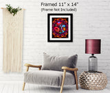 Red fairy art with a swirls and gold sparkles of magic surrounded by a circular mandala border of red and orange patterns called "Gratitude Mandala", framed and displayed over a chair