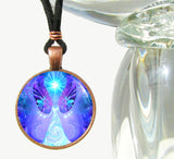 Necklace with violet and white pastel angel with a blue starburst overhead