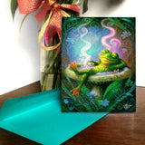 A colorful greeting card featuring a frog soaking in a mushroom hot tub surrounded by swirling flowers and foliage, created by Primal Painter.