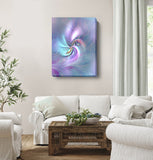 Pastel abstract art canvas print called Inner Vision by Primal Painter featuring a central eye with swirling colors of pink, purple, blue, and gray emanating from the center. hanging over a white couch