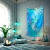 Decorative tapestry with a blue and green abstract design called Intuitive Sparks by Primal Painter in a room with candles, plants, and a Buddha statue.