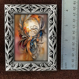 Mini goddess art print called The Keeper by Primal Painter and includes a decorative pewter frame.  Next to a ruler