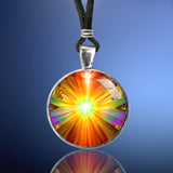 Bright orange Light Being necklace in a silver colored round pendant setting