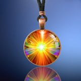 Bright orange starburst Light Being necklace in a copper colored setting