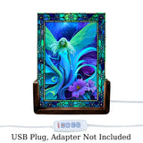 Glowing acrylic light featuring a blue and teal fairy with purple flowers and stained glass-like flower border. Art by Primal Painter.  Usb plug, adapter not included