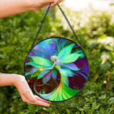 Textured glass fairy suncatcher, floral theme, featuring Lyrica Nightingale by Primal Painter in vivid green, purple, and red violet. 