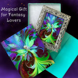 Colorful fairy artwork in a decorative frame and a matching greeting card with text 'Magical Gift for Fantasy Lovers' on a dark background.