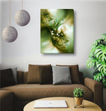 Abstract art canvas print with mossy greens, creams, and taupe in a swirling, earthy pattern hanging over a brown couch