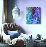 Abstract art canvas print with swooping botanical elements in blue, purple, and teal by Primal Painter. Displayed on a lavender wall. Hanging over a cozy chair
