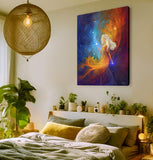 Vivid goddess art canvas print by Primal Painter called Nebula in hot reds, warm oranges and celestial blue with stars. Hanging over a bed with plants