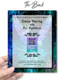 Back of a Blue, purple, and black ethereal  fairy art  greeting card with art nouveau flourishes and a feathery border by Primal Painter