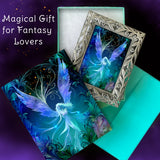 Gift set of framed artwork of a dreamy fairy with blue wings against an Art Nouveau background including a matching greeting card; art by Primal Painter. 