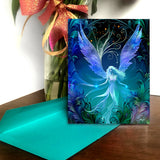 Blue, purple, and black ethereal  fairy art  greeting card with art nouveau flourishes and a feathery border by Primal Painter