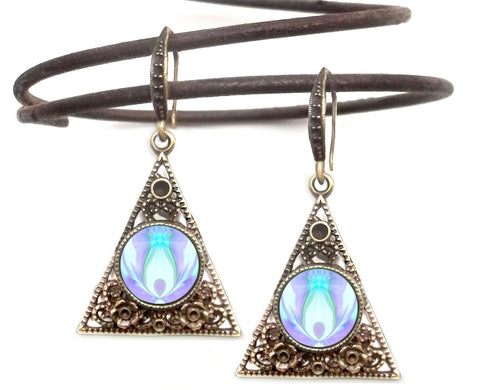 triangle dangle earrings with lacy bronze filligree and featuring white and violet abstract angel art print sealed under a glass dome
