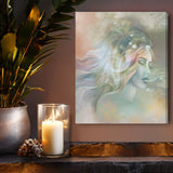 Abstract art canvas print called by Pele by Primal Painter featuring the Hawaiian goddess in pastel earth tones. Hanging above a shelf with a candle