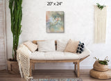 Abstract art canvas print called by Pele by Primal Painter featuring the Hawaiian goddess in pastel earth tones. Hanging over a couch