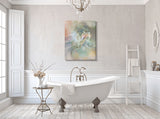 Abstract art canvas print called by Pele by Primal Painter featuring the Hawaiian goddess in pastel earth tones. Hanging over a bathtub