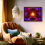 A central orange light being radiates outward, the seven chakra colors arching above and below in a full spectrum of light, all set against a mandala fractal purple background. Art by Primal Painter. Framed over a chair