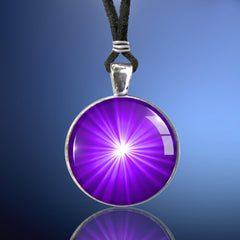 handmade chakra necklace featuring a bright purple starburst art print sealed under glass and representing the  third eye chakra by Primal Painter