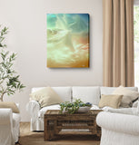 ethereal angel abstract art print in pastel orange, cream, and blue by Primal Painter, canvas print in a living room
