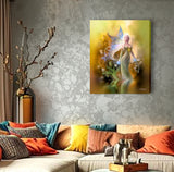 Golden fairy canvas art print in warm golden colors of yellow, brown, and rust by Primal Painter. Hanging over a couch with colorful pillows
