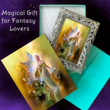 Framed golden fairy art print with a teal gift box and matching greeting card in warm earth tones by Primal Painter. 