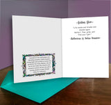 Open card with text and decorative elements on a wooden surface with a purple background