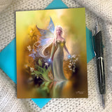 Greeting card featuring a golden fairy art print in warm earth tones by Primal Painter. 